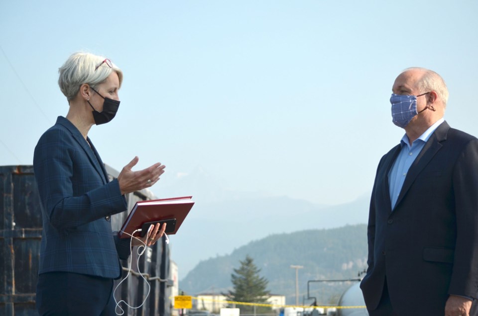Mayor Karen Elliott addresses NDP Leader John Horgan during his Squamish campaign stop on Friday.