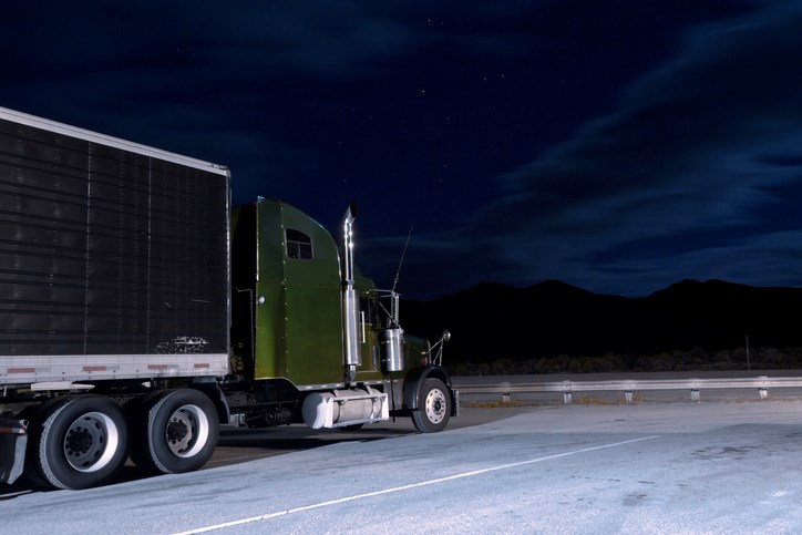 FILE - Parked semi-truck. The incident is alleged to have occurred in the cab of the man's parked semi-truck outside a MacDonald's.