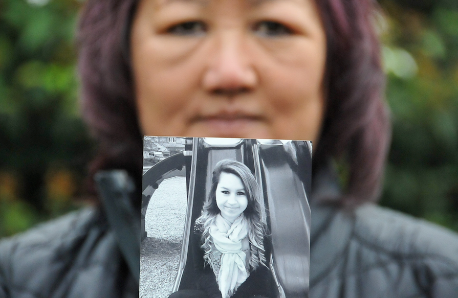 Carol Todd, with a photo of her daughter Amanda