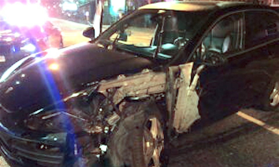 Porsche after it was driven into a metal lamp post by an allegedly impaired driver Oct. 6.