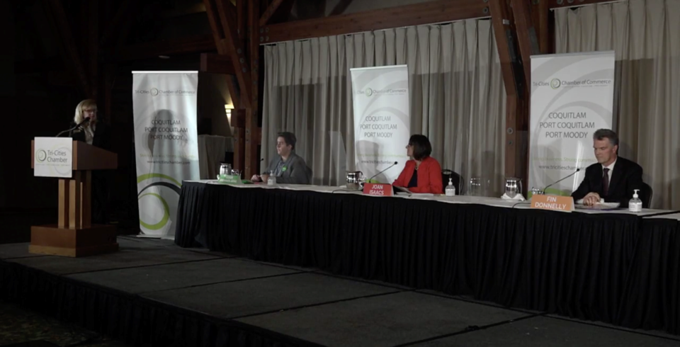 Held on Zoom and Facebook in front of an empty hall, the three candidates and moderator were seated