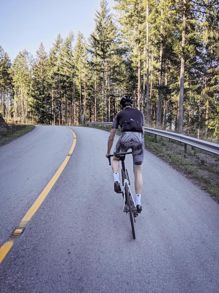 Man riding a bike on the road