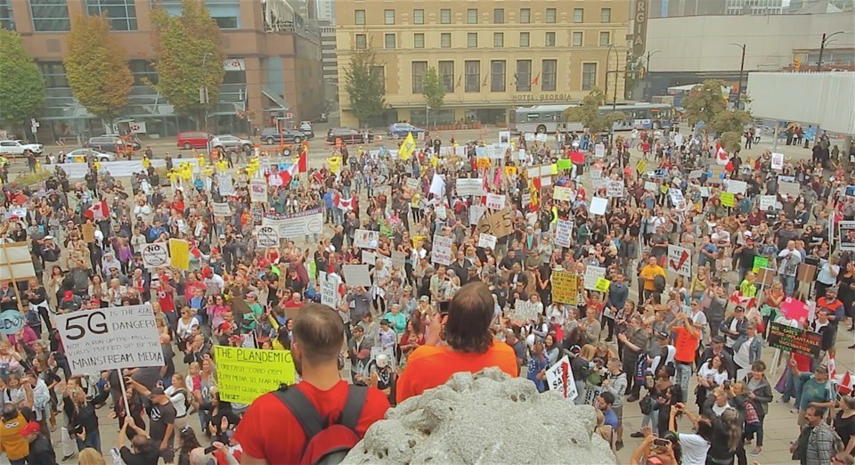 Several hundred anti-maskers marched the streets and gathered at Vancouver Art Gallery in September.