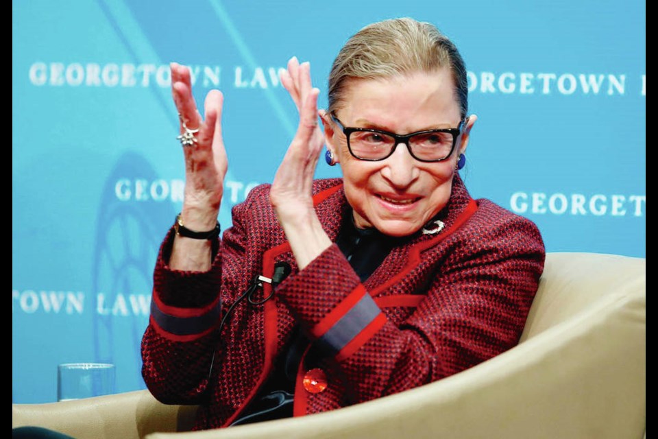 April 6, 2018: Ruth Bader Ginsburg applauding after a performance in her honour after she spoke about her life and work during a discussion at Georgetown Law School in Washington. Alex Brandon, The Associated Press