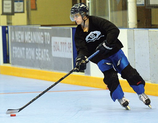 Evan Anderson hits high speed during a practice session at Karen Magnussen Arena.