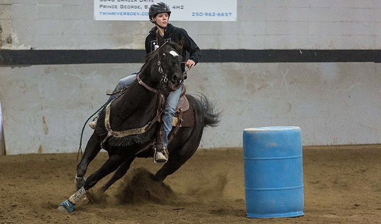 Citizen Photo by James Doyle. A horse and rider race around barrels on Saturday morning at the Prince George Agriplex while competing in a Gymkhana that was hosted by the Prince George Rodeo Association.