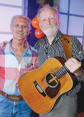 North Shore Inline Hockey League director Pat Riccardi with singer-songwriter Valdy