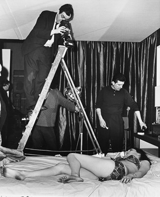 Photographer Weegee with actor Peter Sellers after the shooting of a pie scene which Kubrick never used in the finished film.