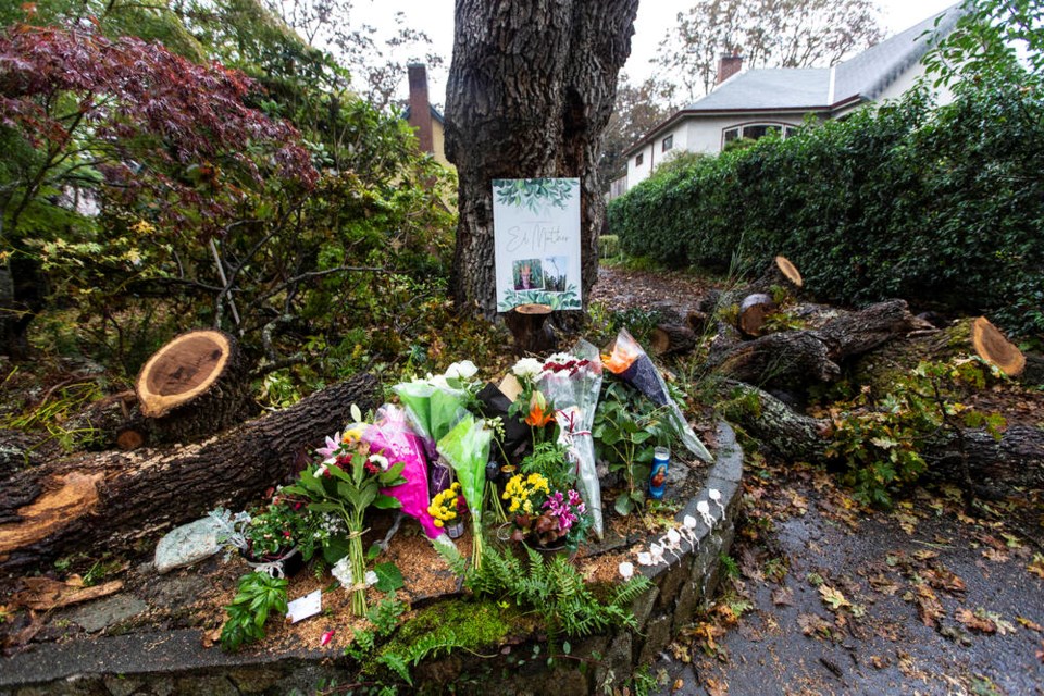 A memorial to Eddie Mather, who died working with a crew removing a large Garry oak tree at Byng Street and McNeill Avenue in Oak Bay.  DARREN STONE, TIMES COLONIST