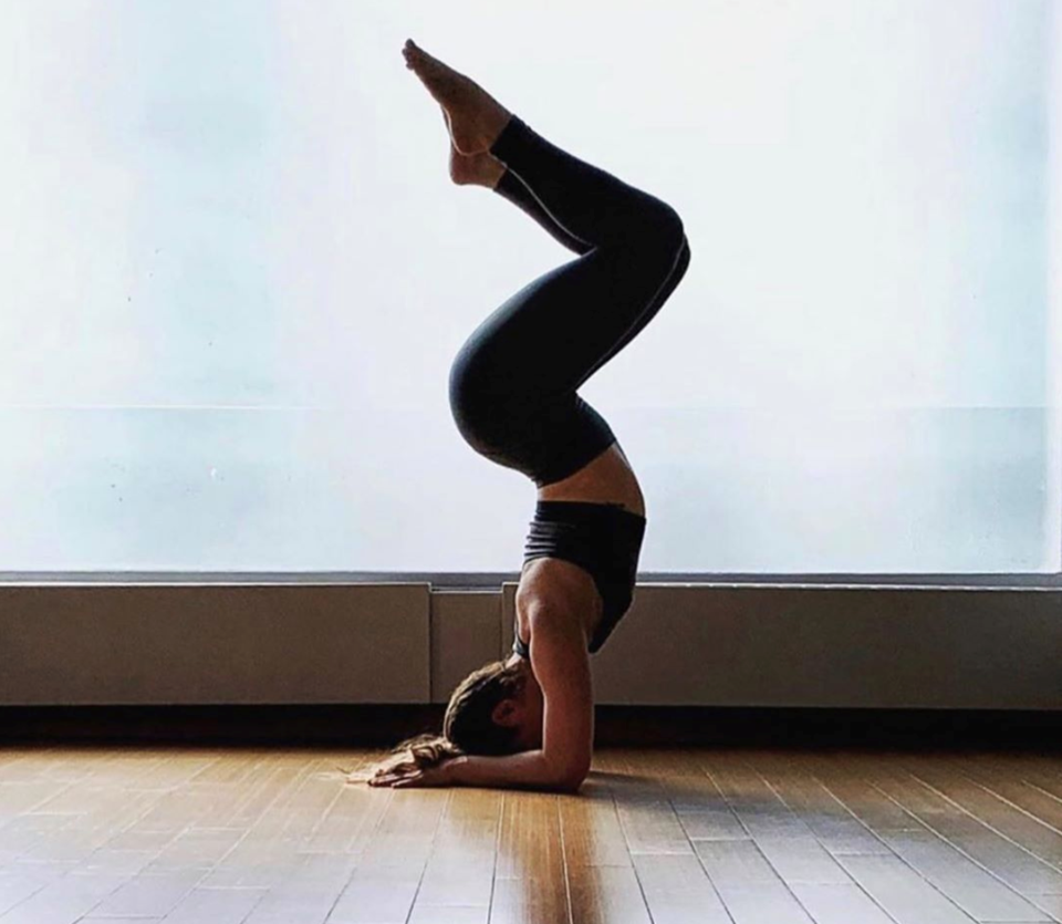 A yoga instructor at Oxygen Yoga and Fitness poses at the Port Coquitlam studio