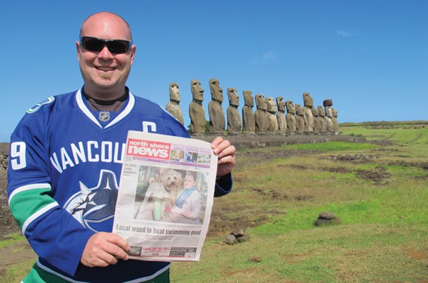 Marc Tacchi takes the North Shore News to Easter Island in Chile. The stone platform in the background is known as Ahu Tongariki, and the figures are called Moai.