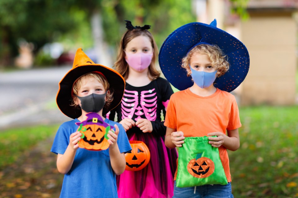 trick-or-treating, kids in masks, Halloween