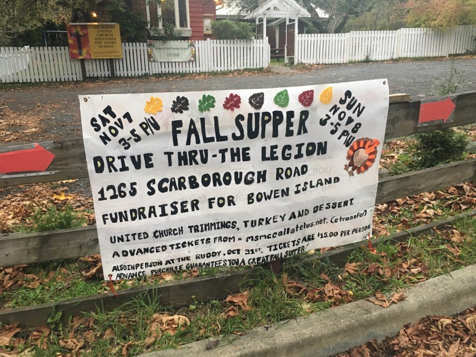 A banner on the fence in front of the church