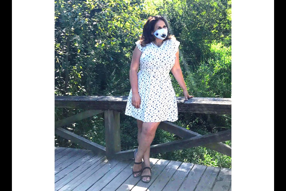 Karen Lorena Parker wearing one of her six mask designs that she is selling to help raise funds for the BC Cancer Foundation. Photo submitted