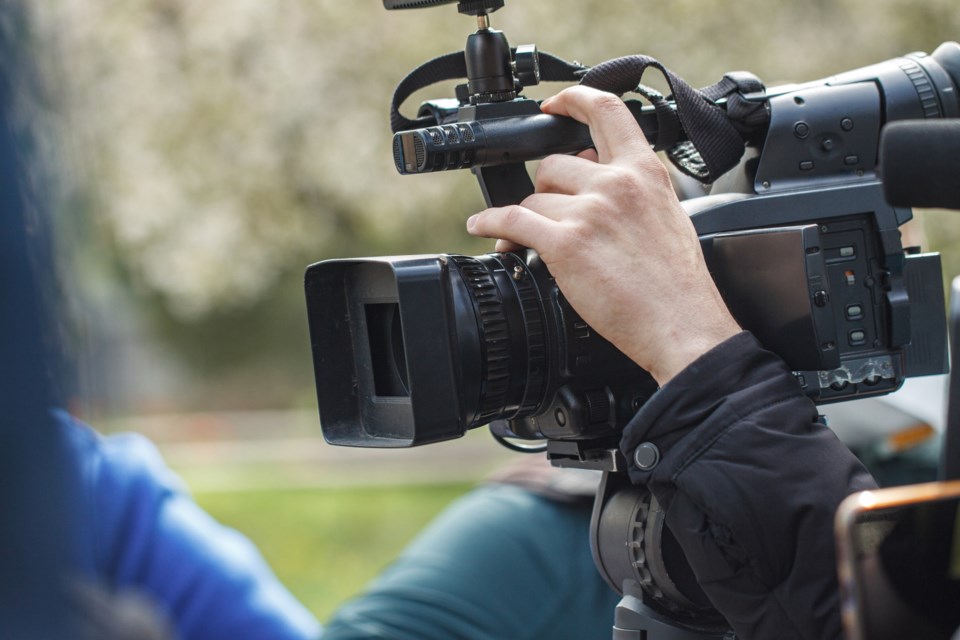 video camera, filming, stock photo