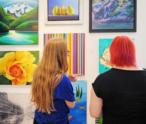 Hundreds of artists, art lovers and curious onlookers investigated the colourful works on display at more than a dozen South Granville art galleries as part of Saturday's ArtWalk.