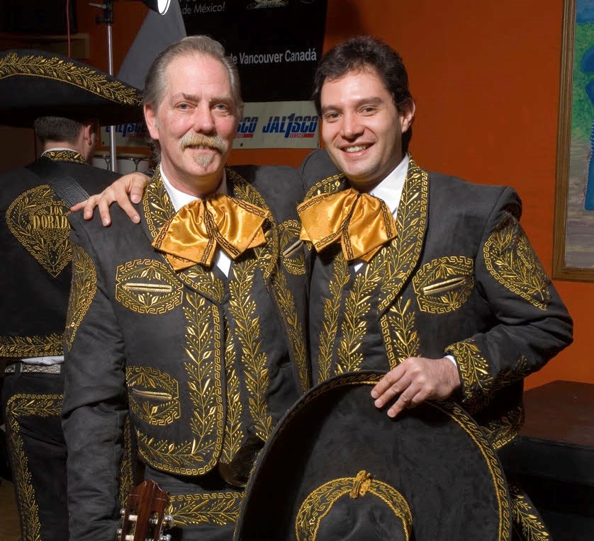 Two men in Mariachi attire