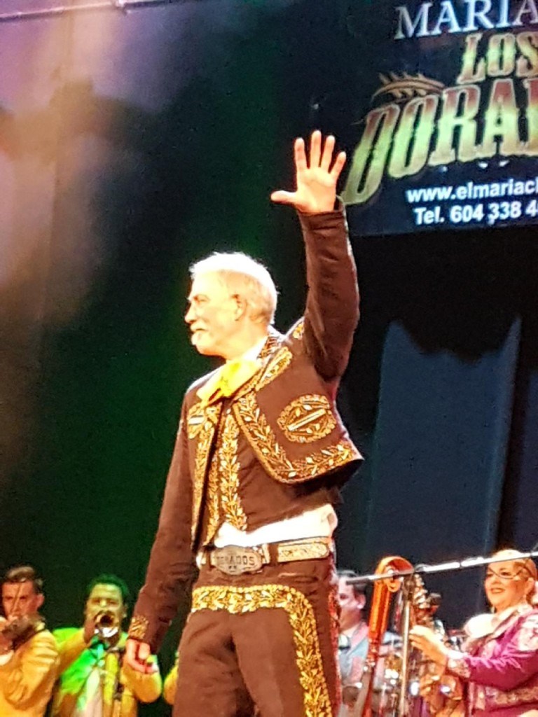 Arndt waving at a crowd