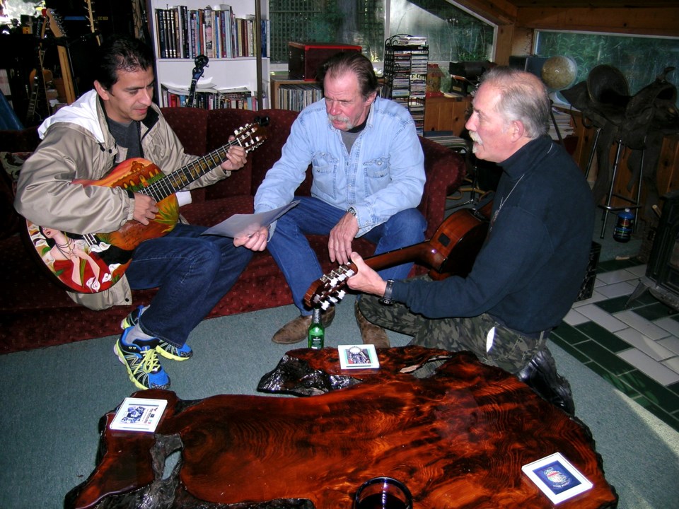 Three men in Arndt's home.