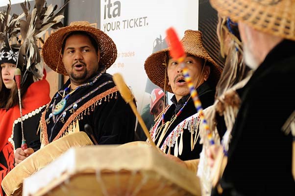 Beat Goes on: Chief Bill Williams (centre) and the Eagle Song dancers from the Squamish Nation performed last Friday on National Aboriginal Day at Klahowya Village.