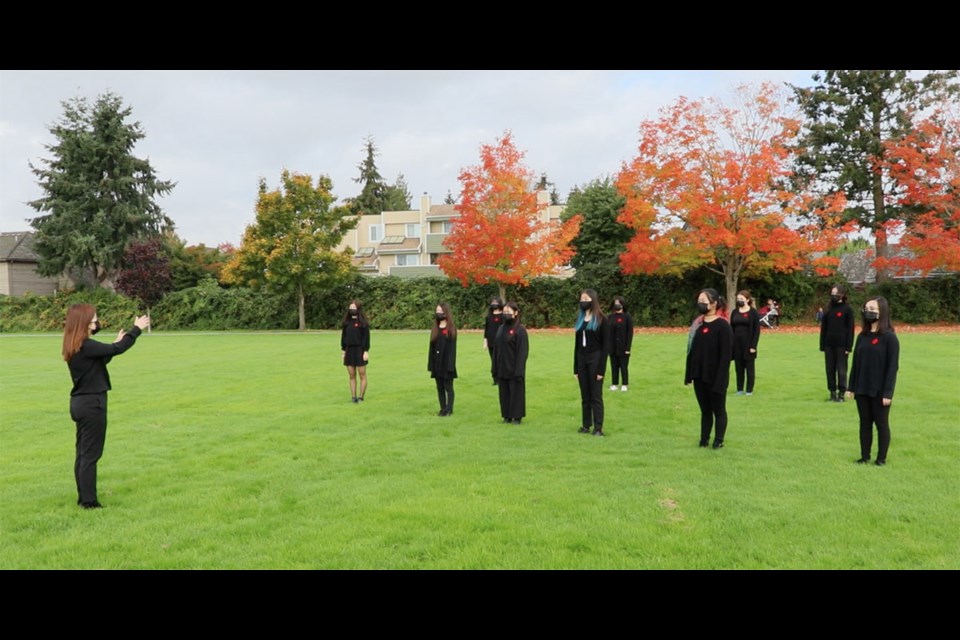 R.C. Palmer secondary's music teacher Iris Chan (left) and the school's choir recording their list of songs ahead of Remembrance Day. Photo submitted