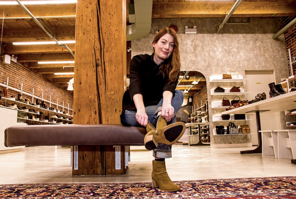 Abbey Hopkins, manager of Gravity Pope, a high-end footwear June 16 on Water Street. | Chung Chow