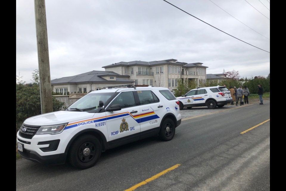 There was a massive police presence outside a Richmond mansion on Wednesday around noon. Graeme Wood photo