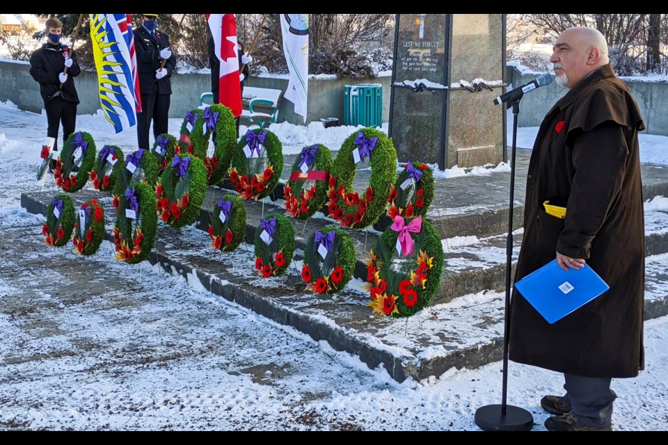 Pastor Wally Pohlmann closes the ceremony in prayer following the laying of the wreaths in Taylor on November 11, 2020.