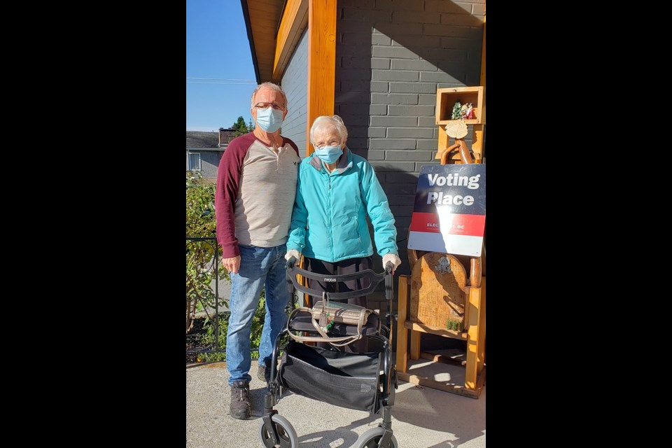 POLL PRESENCE: Eric Williamson accompanied his mother, Hilda, who turned 100 on November 8, to a polling station in Powell River so she could cast a vote in the recent provincial election. Contributed photo