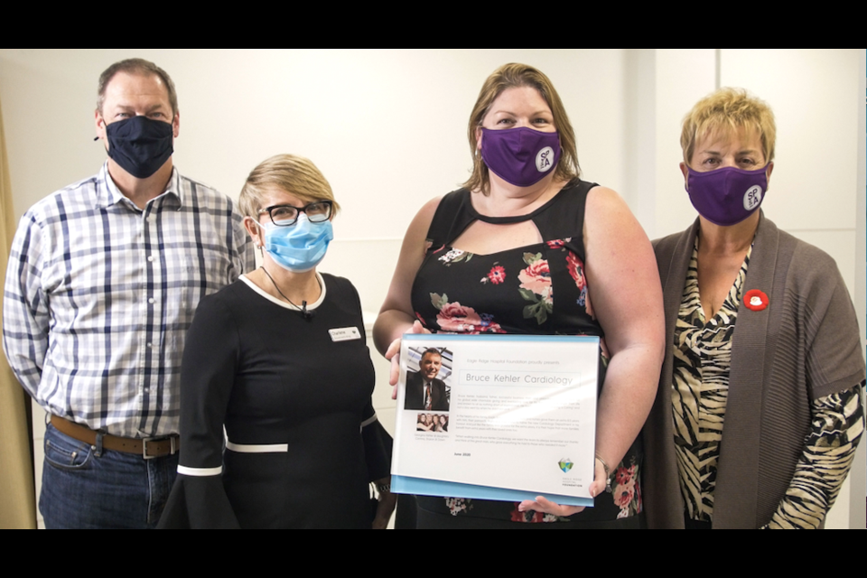 On hand for the official opening of the new Bruce Kehler Cardiology were from left Tom Morton, Eagle Ridge Hospital Foundation board chair, Charlene Giovannetti-King, ERHF executive director, Sharon Perry, daughter and Georgina Kehler, wife. Everyone masked up for this COVID-19-safe event to mark the opening of the new cardiology department.