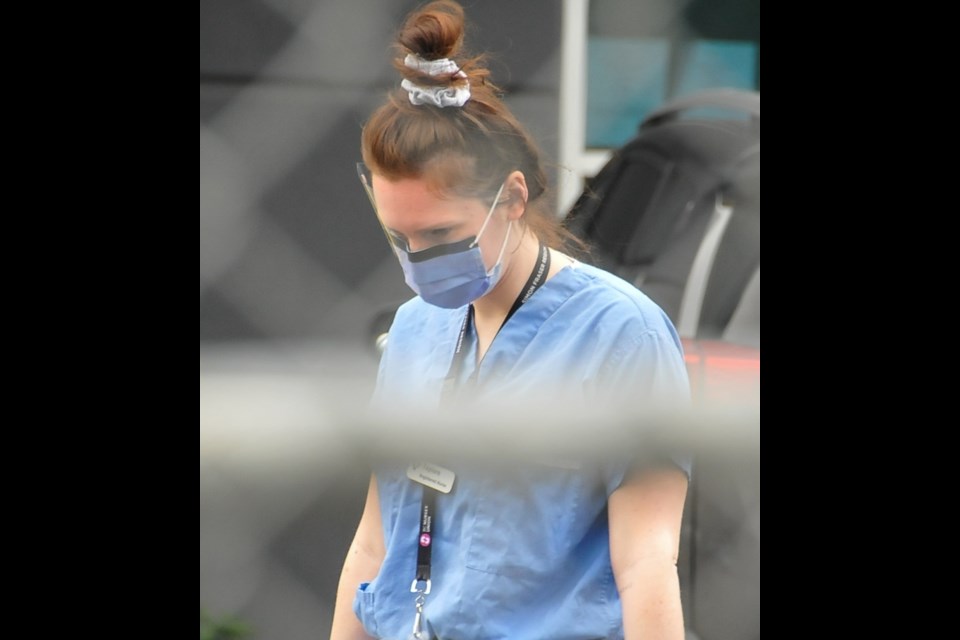 A nurse from Fraser Health attends an outbreak at Superior Poultry Processors Ltd. Thursday, April 23. Since then, the health authority has become the epicentre for the disease in B.C., and rising cases could mean contact tracers face overwhelming workloads as they try to keep up with the virus.