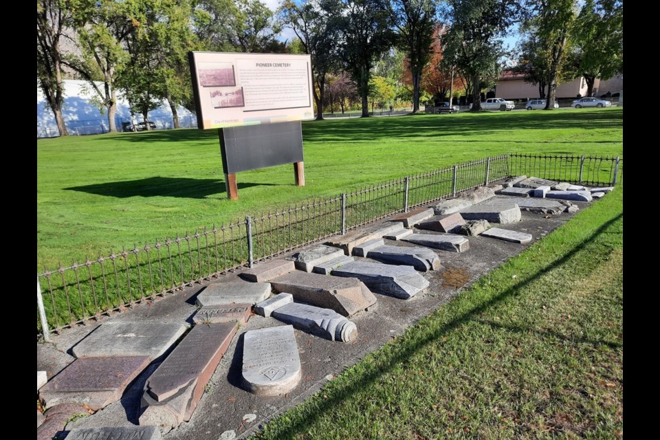 Pioneer Cemetery showing the headstones displayed for safe-keeping on the ground.