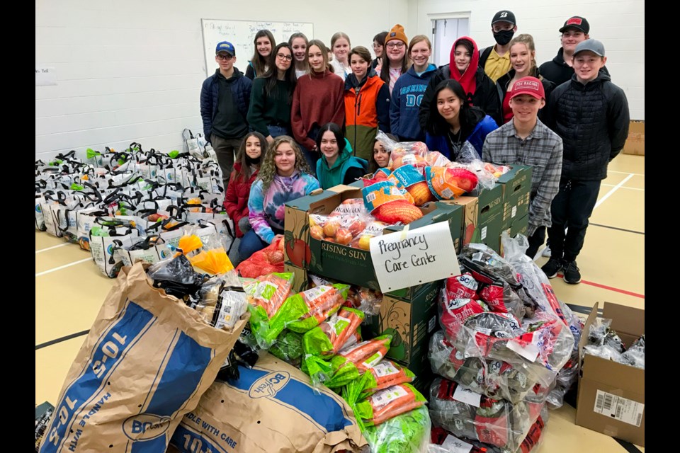 The Grade 9 leadership class at Bert Bowes school, all part of the same cohort, with some of the food being donated to Fort St. John community groups through the through the Fresh To You fundraiser, Nov. 20, 2020.