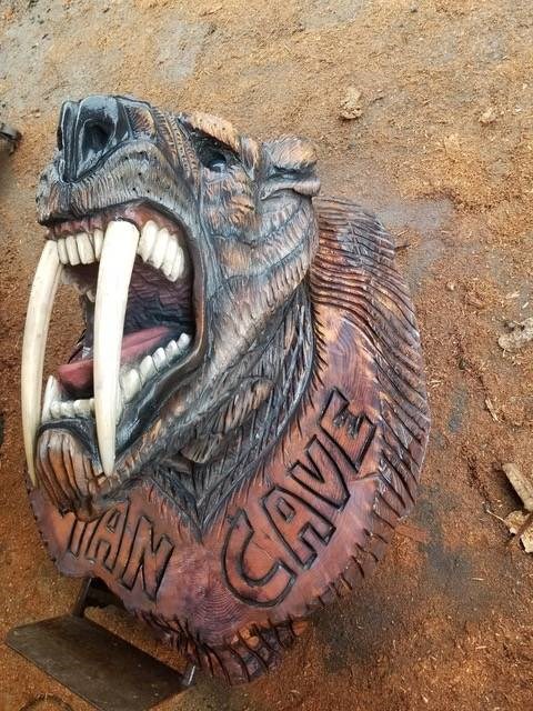 A sabre-tooth tiger carving by Dan Richey was stolen from a Nanaimo shop. COURTESY OF DAN RICHEY