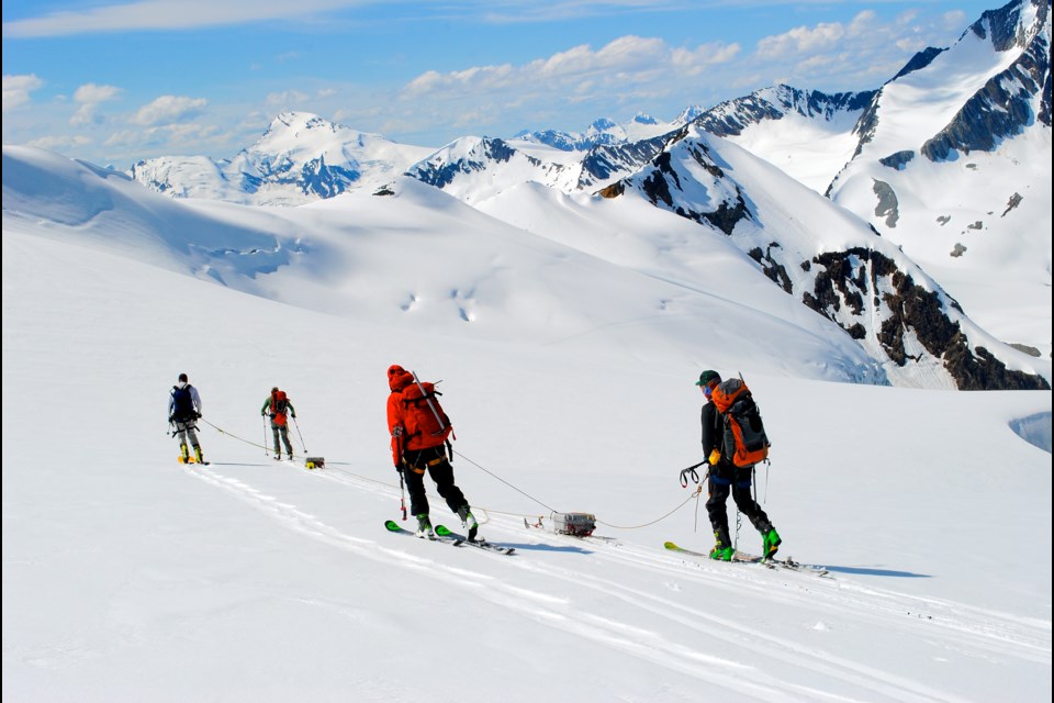 A research team led by the University of Northern British Columbia transports ice-penetrating radar across the Nordic glacier in the Columbia basin.