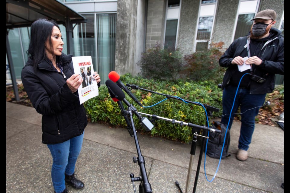 Penny Hart, the mother of Sean Hart, a young Saanich man missing from Seven Oaks Tertiary Mental Health Facility, addresses media at the Saanich police station on Thursday. DARREN STONE, TIMES COLONIST