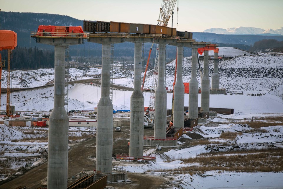 Halfway River bridge piers with girders are installed between the fourth and seventh bridge piers, December 2020.