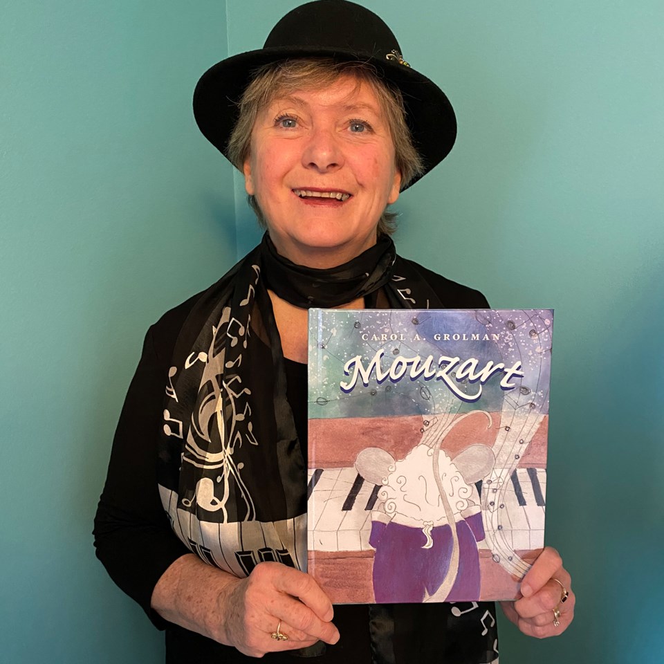 Carol Grolman with her new book.