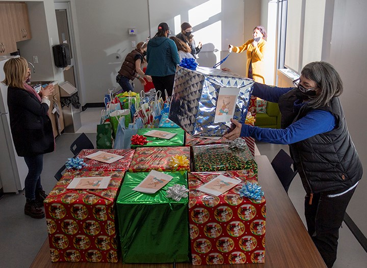 Baljot Mann and Arlene Bassi, with the helping hands of their parents, delivered care packages for