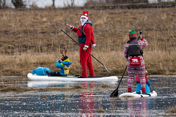 Santa and elves paddleboard in Howe Sound_3