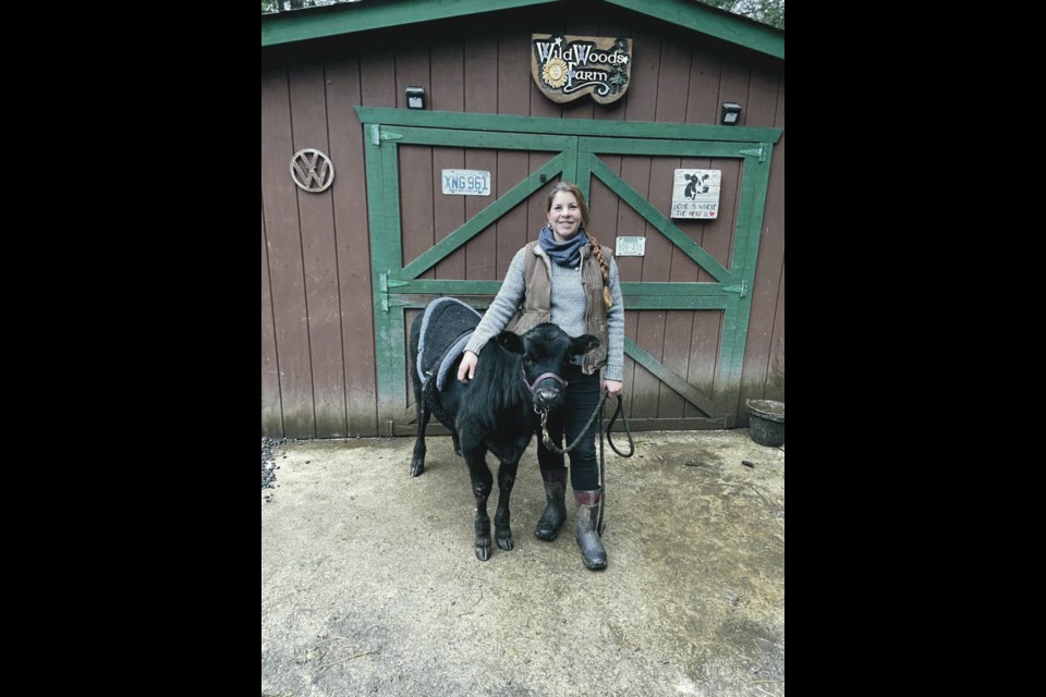 Kristy Sivorot and her steer, Moose. COURTESY OF KRISTY SIVOROT