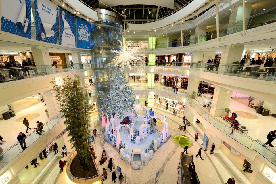Holiday shoppers at Metropolis, Burnaby, B.C.’s biggest mall. | Metropolis at Metrotown