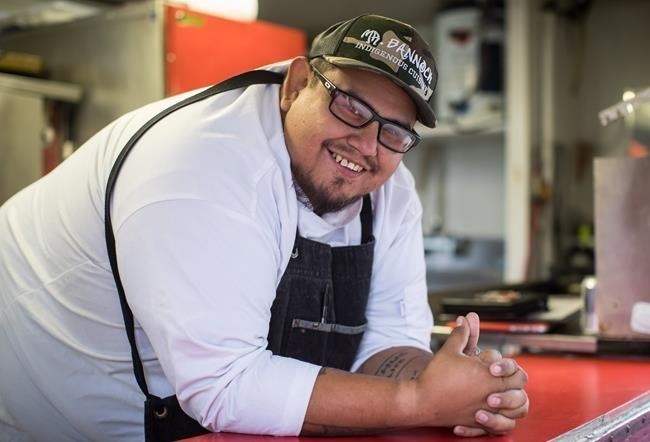 Squamish Nation Chef Paul Natrall poses in the Mr. Bannock food truck.