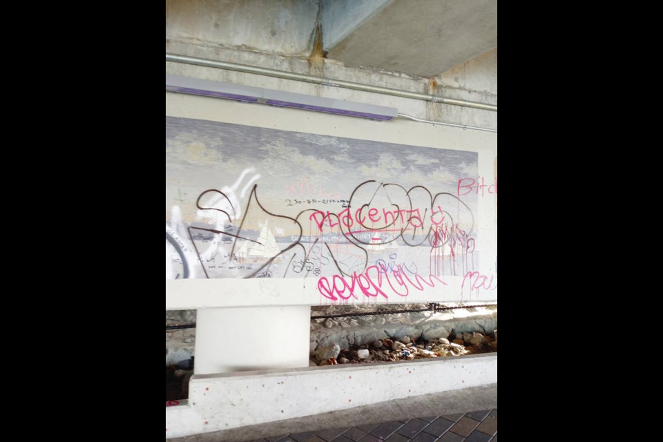 The vandalized public artwork that had to be painted over last month at the Johnson Street Bridge. John Amon