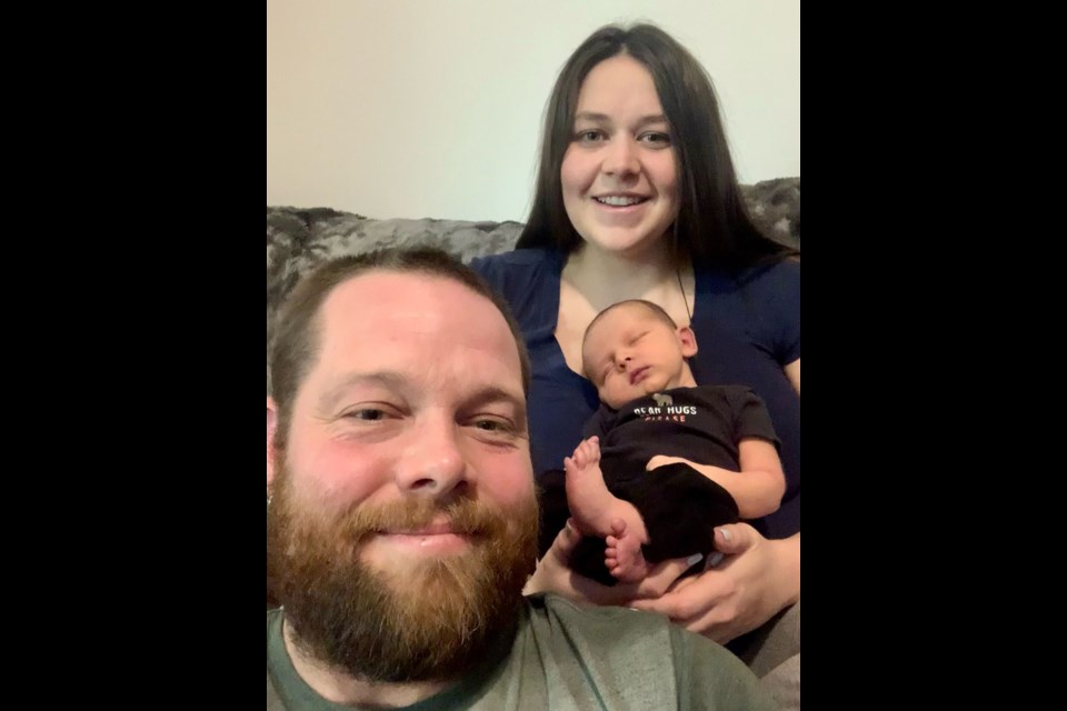 The family of three, at home in Whistler.