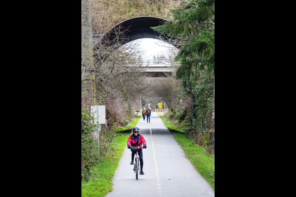 The CRD is considering widening and lighting up the most congested sections of the Lochside and Galloping Goose trails, with separate lanes for cyclists and pedestrians. DARREN STONE, TIMES COLONIST