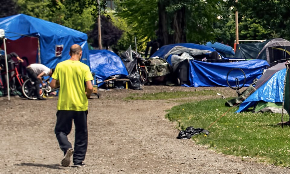 Homeless people camped in Vancouver's Stathcona Park. | Chung Chow