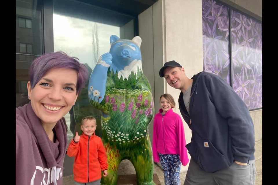 Jen Rubadeau is seen as she takes a selfie during the Family Day Adventure Cruise with her family, including dad, Aaron Tkachuk, daughter Claire Tkachuk and son Owen Tkachuk, as they complete one of 25 activities during the scavenger hunt that took place around Prince George.