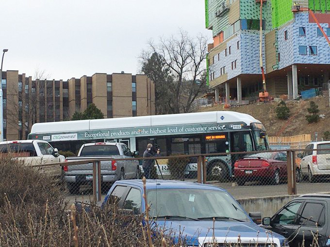The bus, travelling westbound up Columbia Street on Feb. 22, 2021, came to rest overtop the sidewalk and bushes, striking vehicles in the Travelodge parking lot just past the Columbia/Fourth intersection.