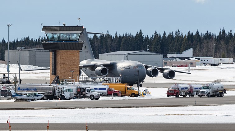 Citizen Photo by James Doyle/Local Journalism Initiative. A RCAF CC-177 Globemaster III transport plane overshadows the control tower prior to take off from Prince George Airport on Saturday afternoon.